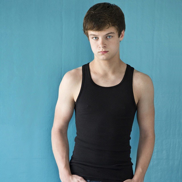 Chandler Canterbury in his black tank top while posing for the camera